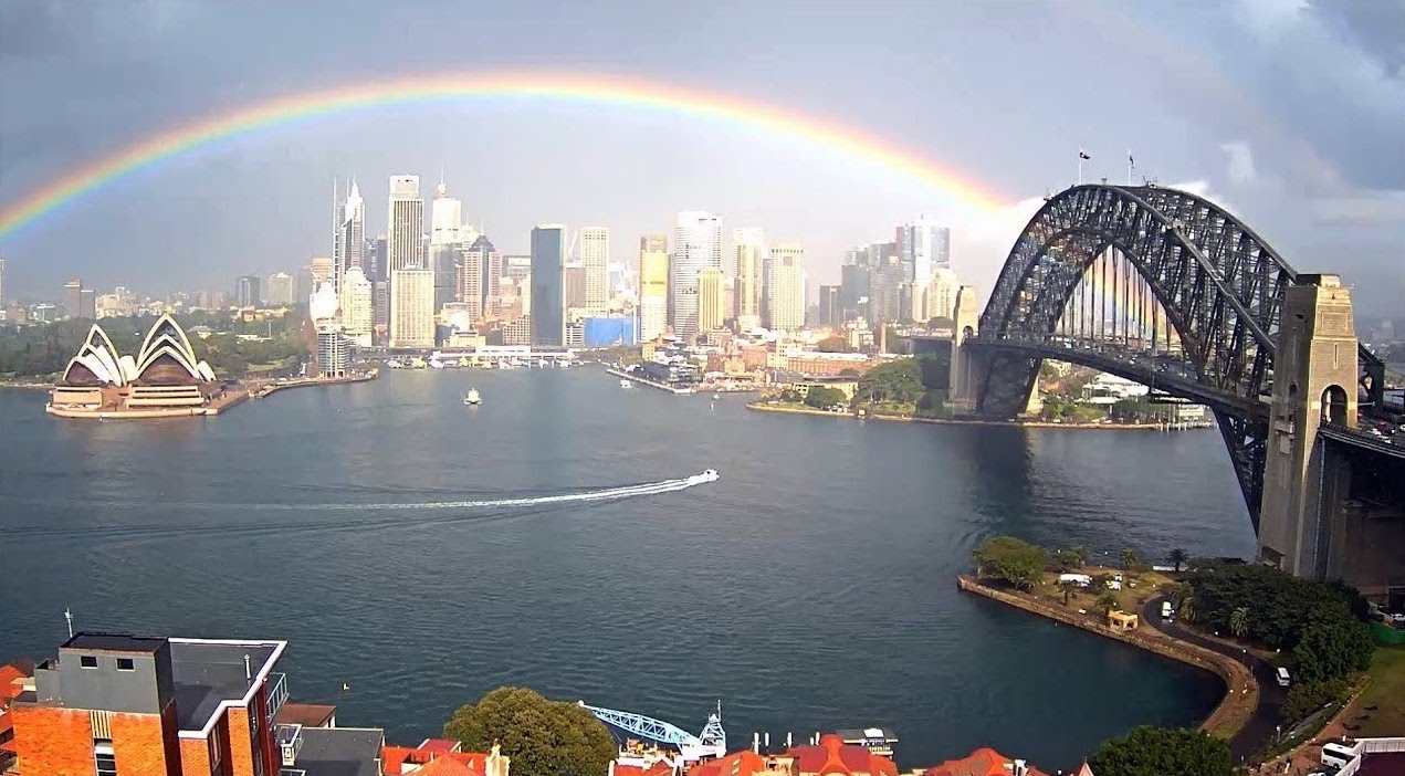 Rainbow in the sky over Sydney CBD skyline
